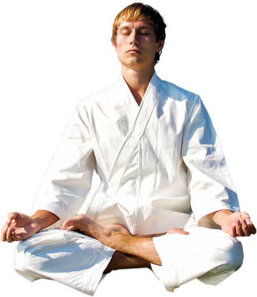 Martial Arts Lessons for Adults in Amarillo TX - Young Man Thinking and Meditating in White