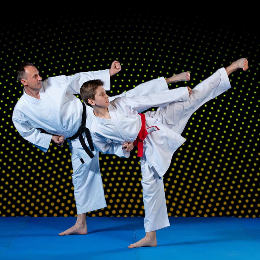 Martial Arts Lessons for Families in Amarillo TX - Dad and Son High Kick